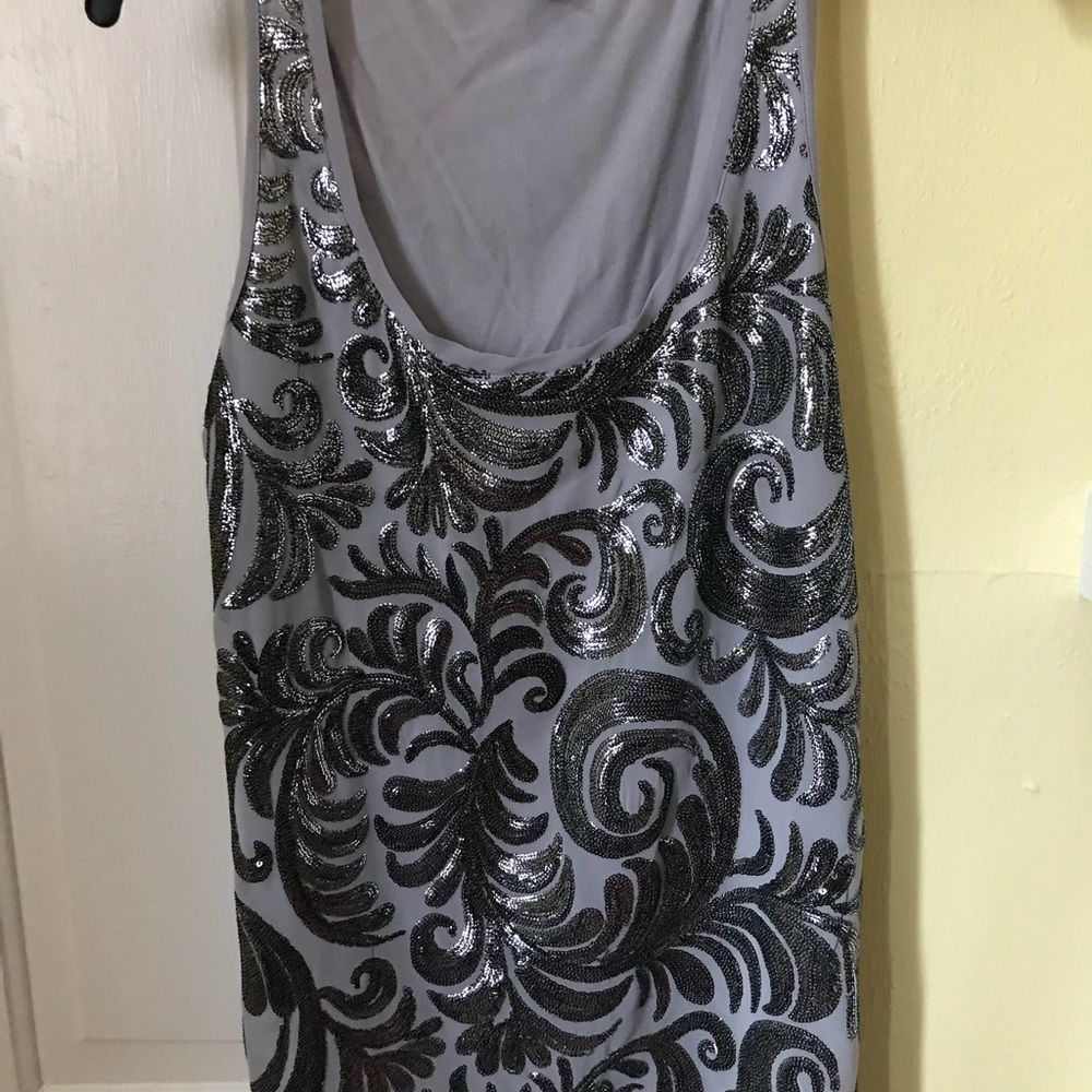Express Tank! Sequin silver/black. Top is lined 100% rayon. Soft and comfy. Med